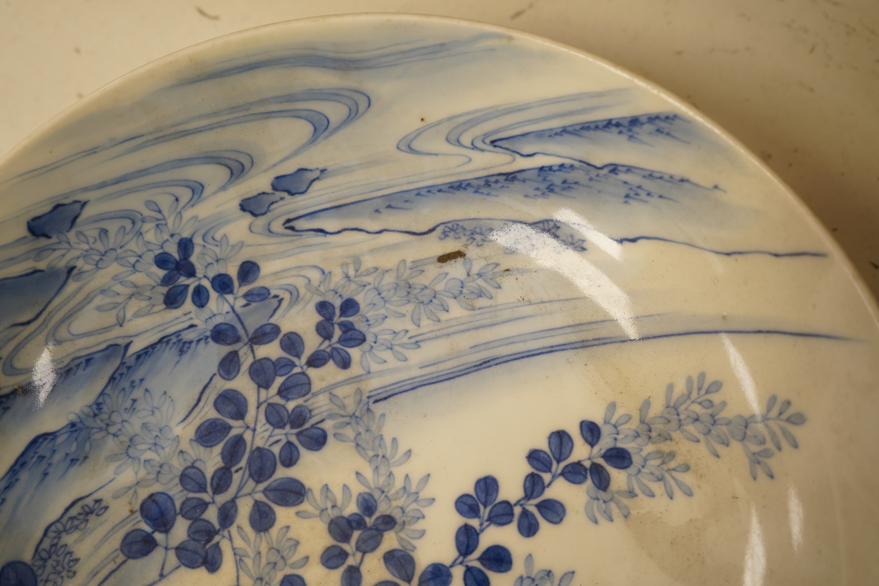 A Japanese Nabeshima style footed dish, 21cm diameter
